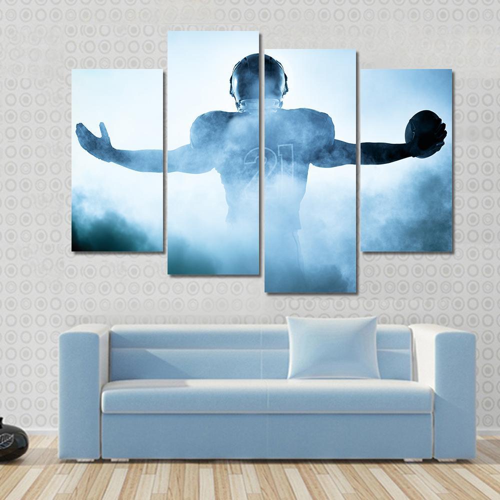 Football Player Portrait Silhouette Canvas Wall Art in black, white and blue, 5 panel Star layout hung on a wall