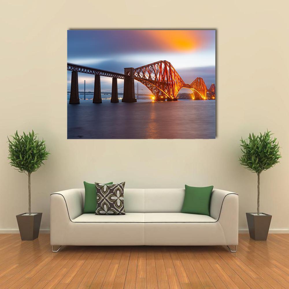 Forth Bridge Scotland Twilight Reflections Canvas Wall Art in orange, blue and purple, single panel hung on a wall