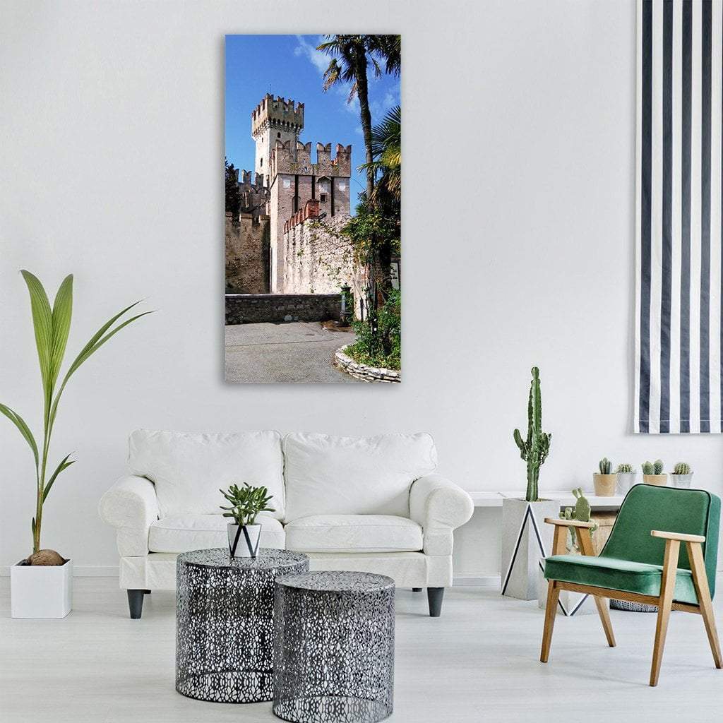 Fortress Tower in Verona Vertical Canvas Wall Art in beige, brown and blue, single vertical panel hung on a wall