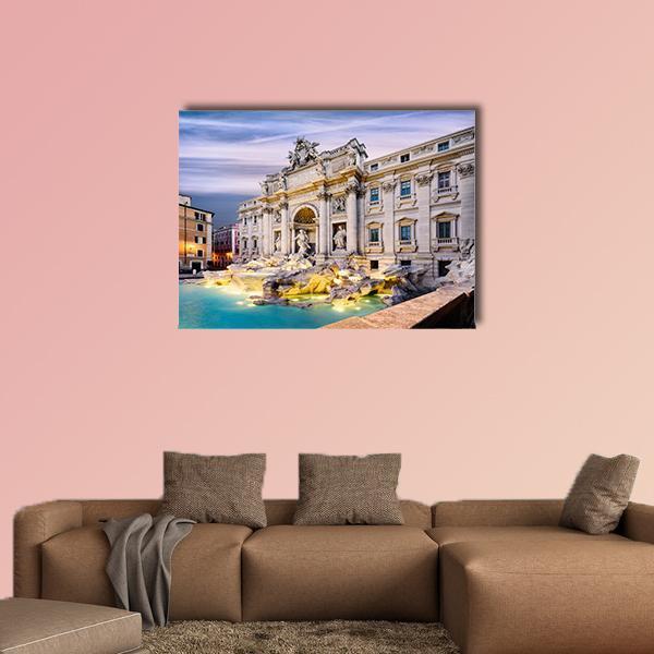 Trevi Fountain in Rome at Evening Canvas Wall Art in beige, yellow and blue, single panel hung on a wall