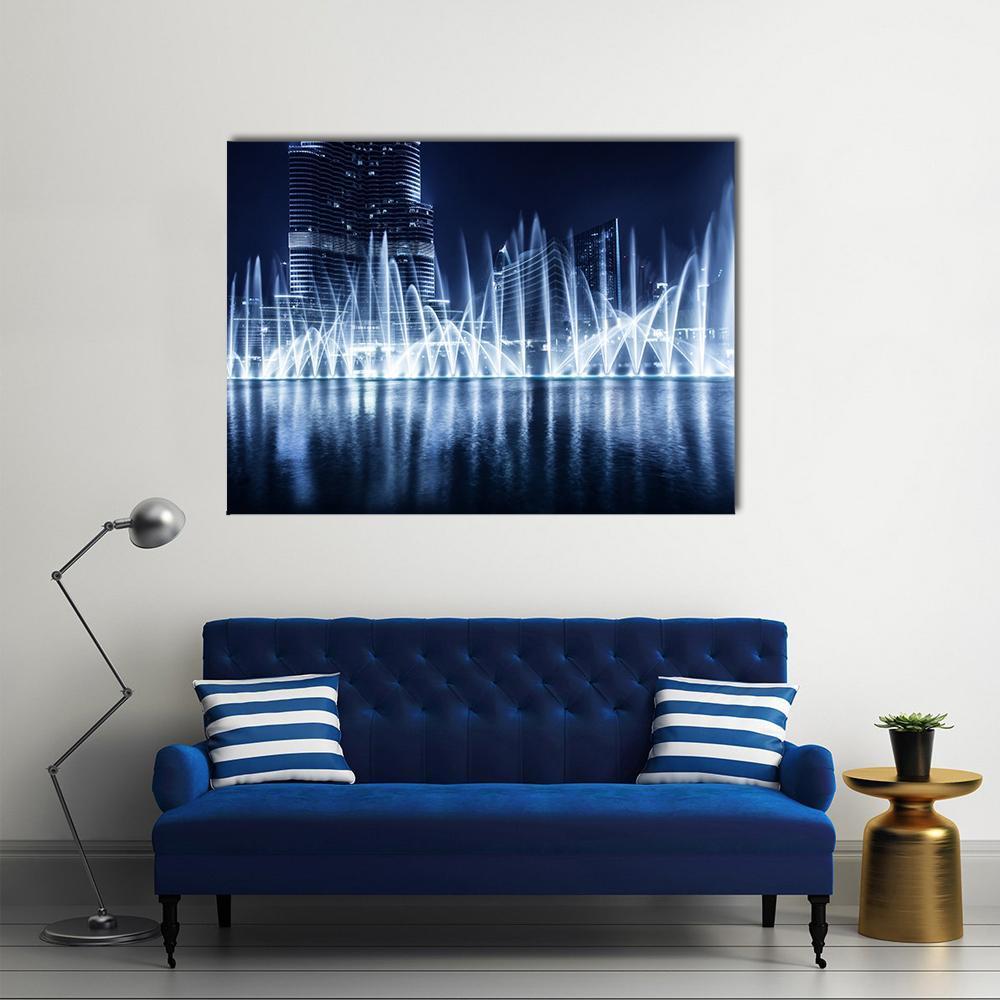 Dubai Fountain at Night Canvas Wall Art in white, blue and navy, single panel hung on a wall