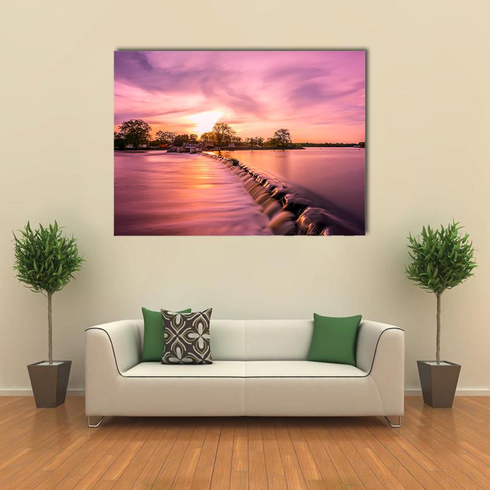 Fox River Dam at Sunset Canvas Wall Art in orange, purple and pink, single panel hung on a wall