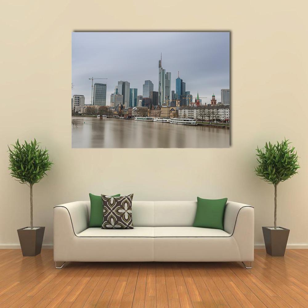 Frankfurt River Skyline Canvas Wall Art in gray, beige and blue, single panel hung on a wall