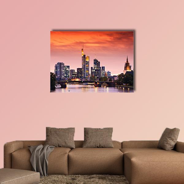 Frankfurt Skyline After Sunset Canvas Wall Art in orange, purple and pink, single panel hung on a wall