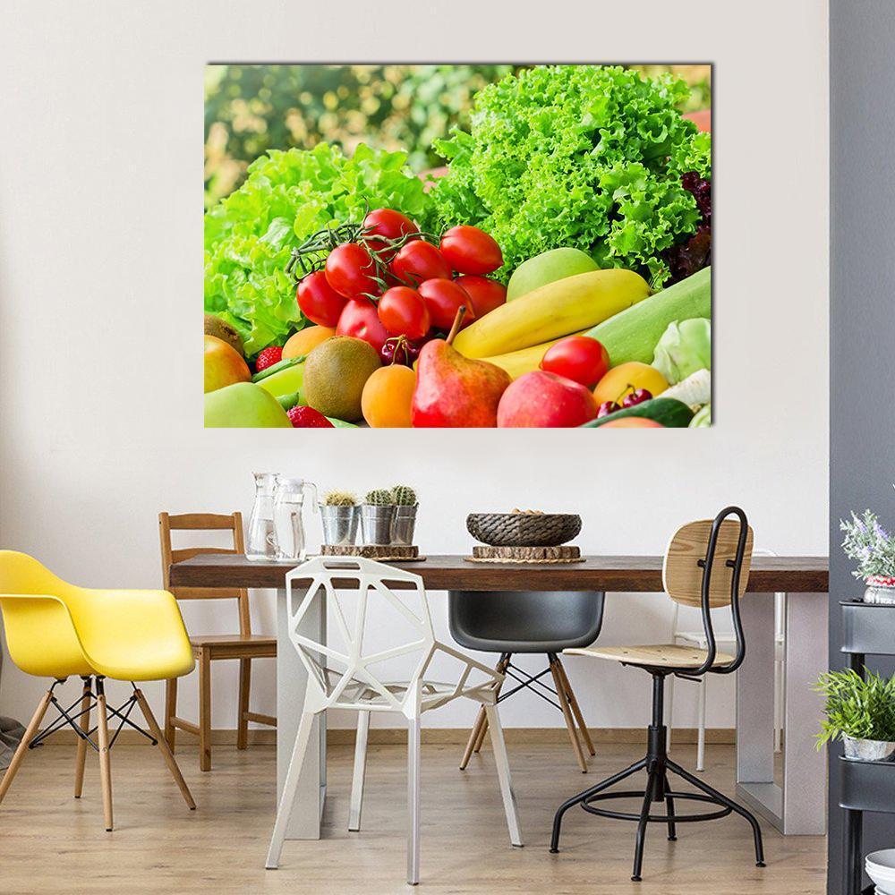 Fresh Fruits and Vegetables Canvas Wall Art in red, yellow and green, single panel hung on a wall