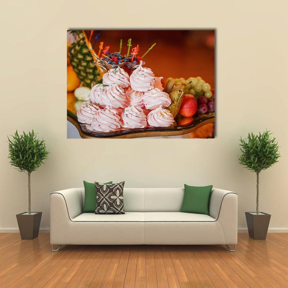 Pink Meringues and Fruit Platter Canvas Wall Art in brown, yellow and pink, single panel hung on a wall