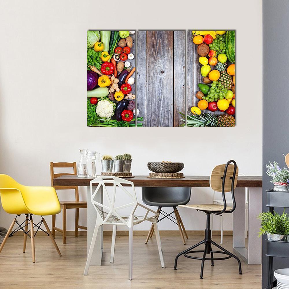 Fresh Vegetables and Fruit on Weathered Gray Wood Canvas Wall Art in gray, green and multicolor, single panel hung on a wall