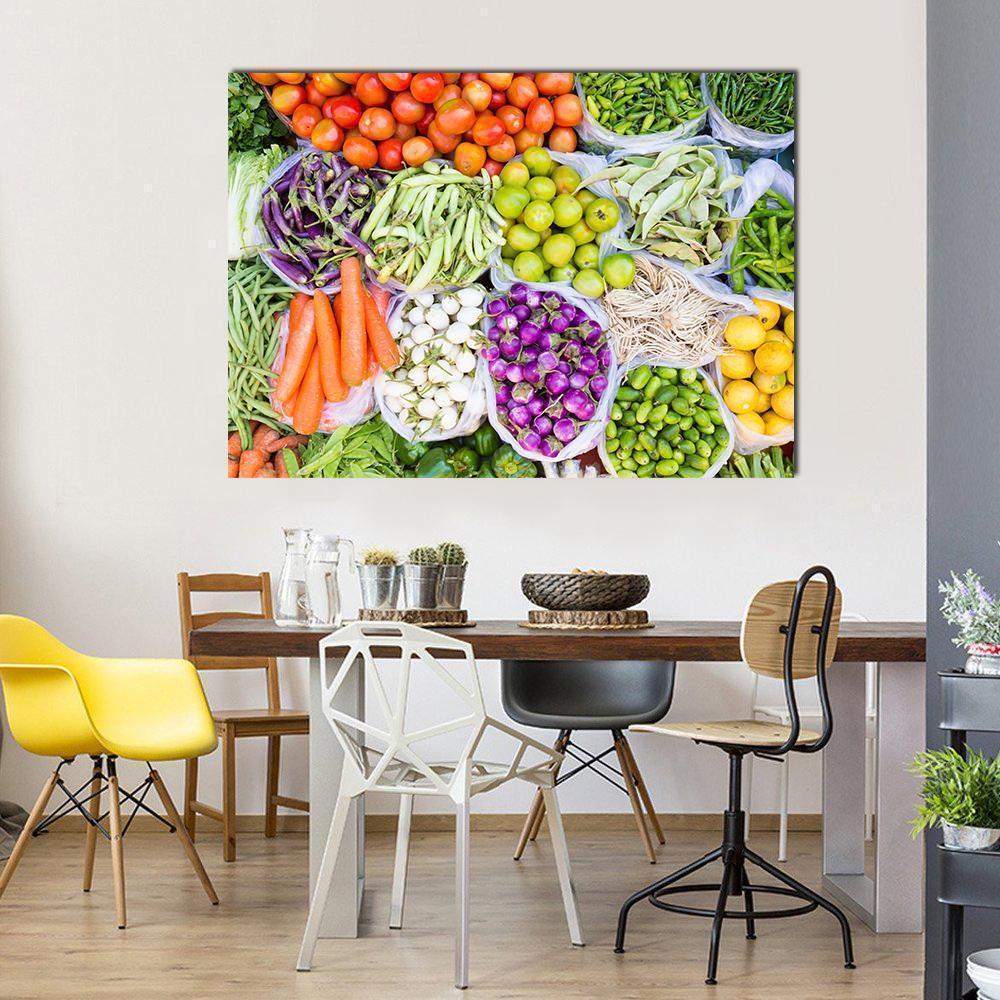 Fresh Market Vegetables Overhead Canvas Wall Art in orange, green and multicolor, single panel hung on a wall