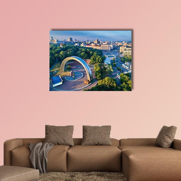 Friendship of Nations Arch Canvas Wall Art in gray, green and blue, single panel hung on a wall