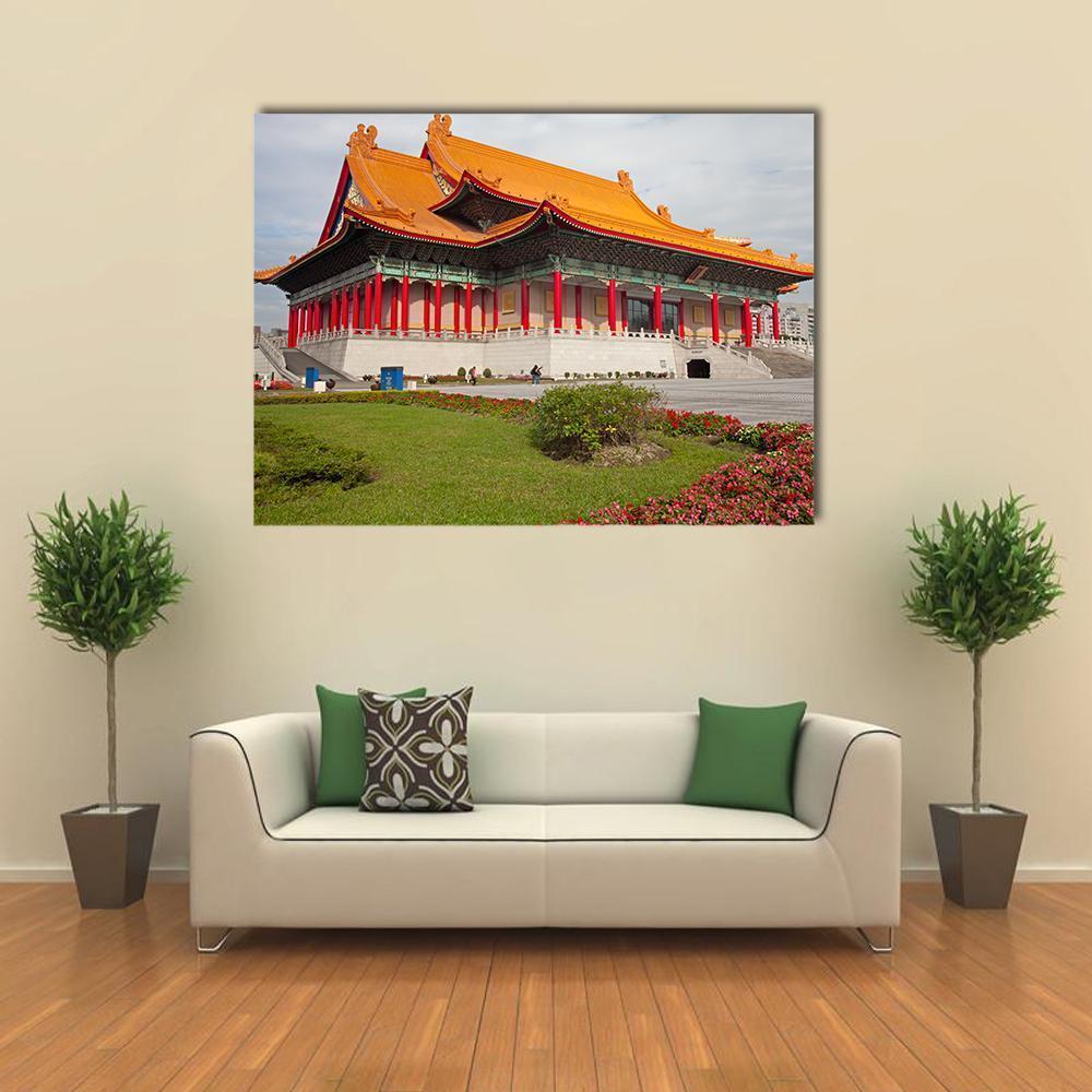 National Concert Hall Canvas Wall Art in red, orange and green, single panel hung on a wall