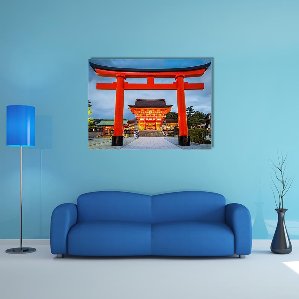 Fushimi Inari Torii Gate at Dusk Canvas Wall Art in red, orange and blue, single panel hung on a wall