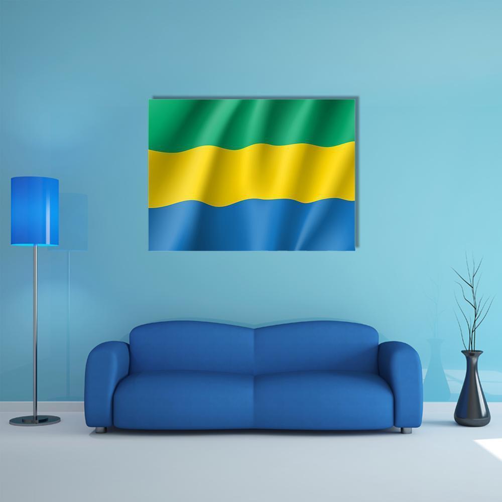 Gabon Flag Waving Design Canvas Wall Art in yellow, green and blue, single panel hung on a wall