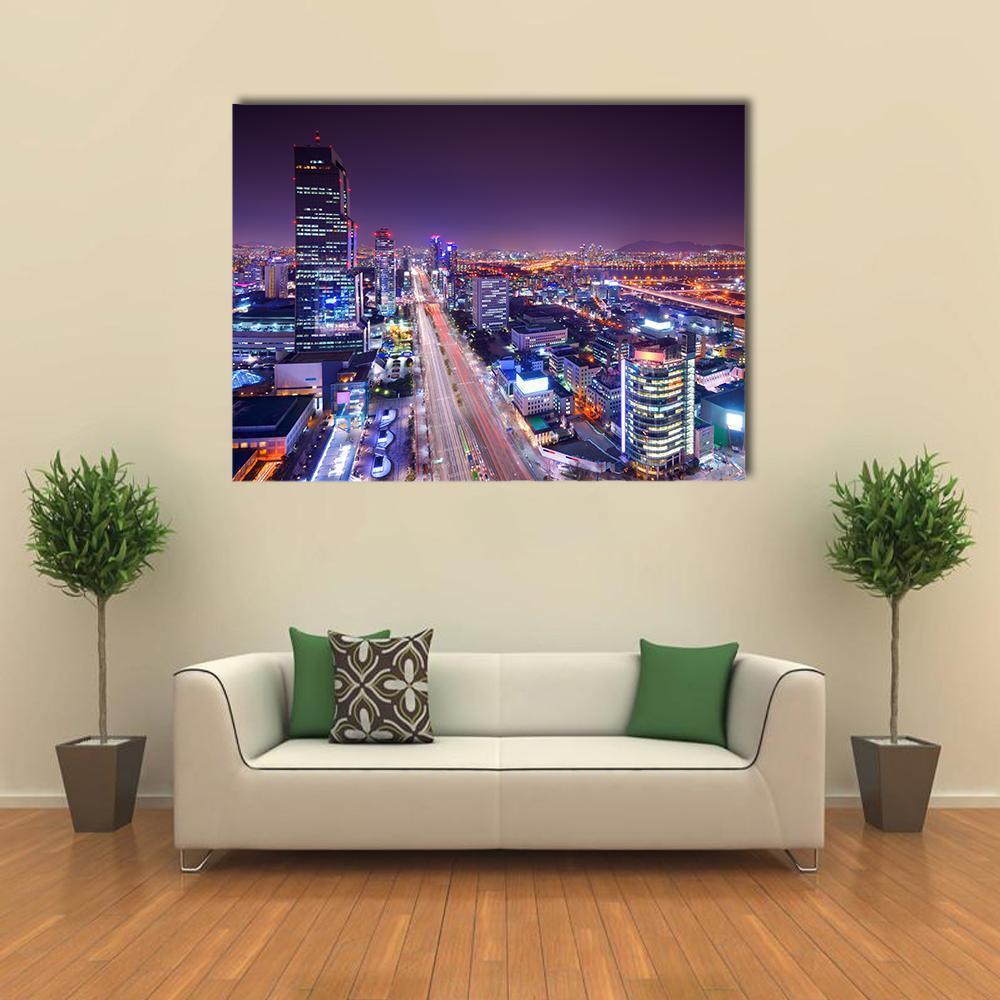 Vibrant Gangnam District Skyline at Night Canvas Wall Art in yellow, blue and purple, single panel hung on a wall