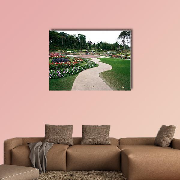 Mae Fah Luang Garden with Curving Path Canvas Wall Art in beige, green and multicolor, single panel hung on a wall