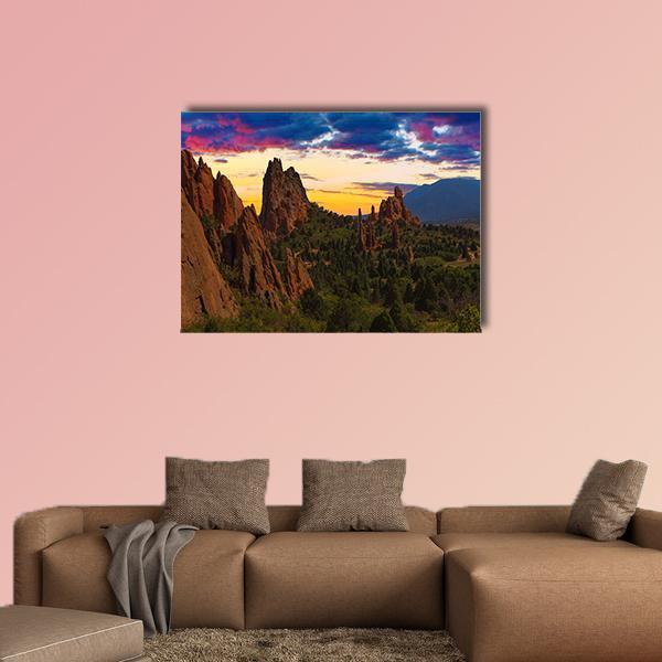 Garden of Gods Rock Formations at Sunset Canvas Wall Art in brown, orange and blue, single panel hung on a wall