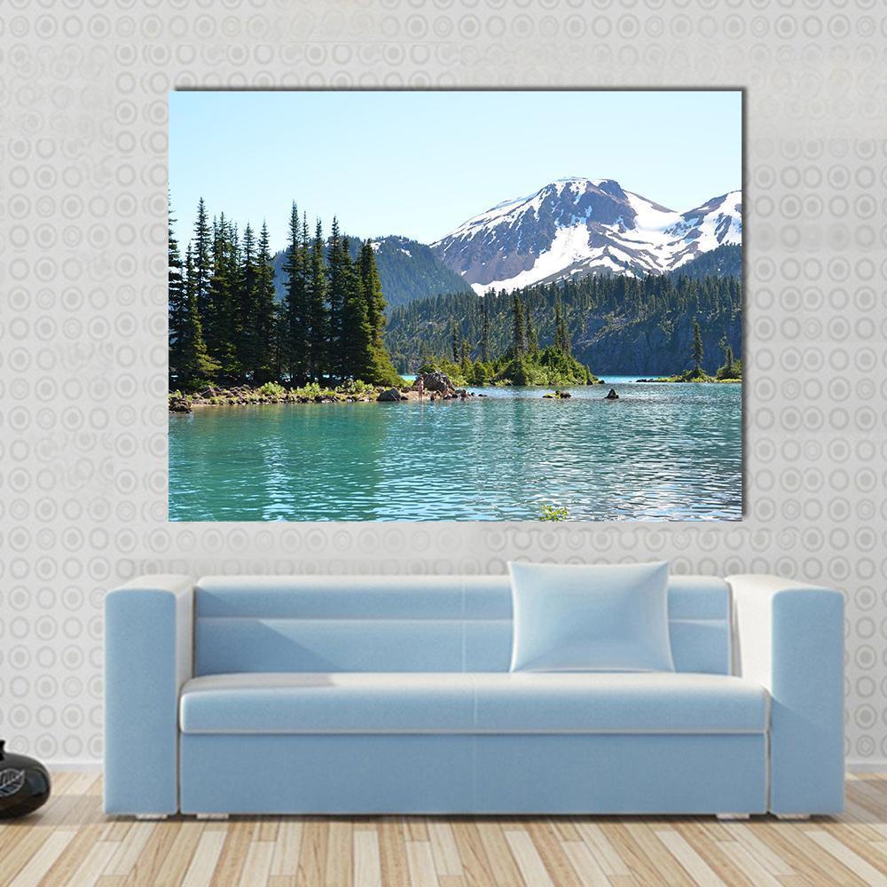 Garibaldi Lake Canvas Wall Art in white, green and blue, single panel hung on a wall