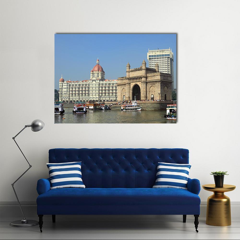 Gateway of India and Taj Mahal Palace Canvas Wall Art in beige, brown and blue, single panel hung on a wall
