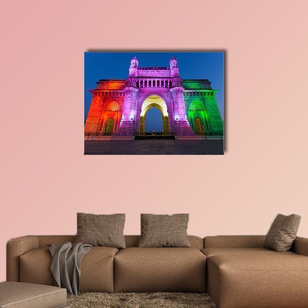Gateway of India Night Illumination Canvas Wall Art in blue, purple and multicolor, single panel hung on a wall