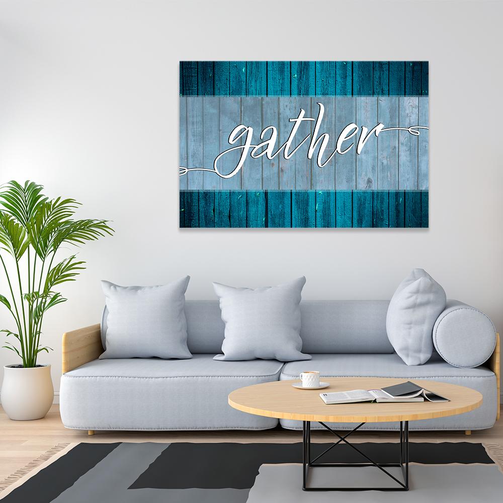 Gather White Cursive on Distressed Wood Canvas Wall Art in white and blue, hung on a wall