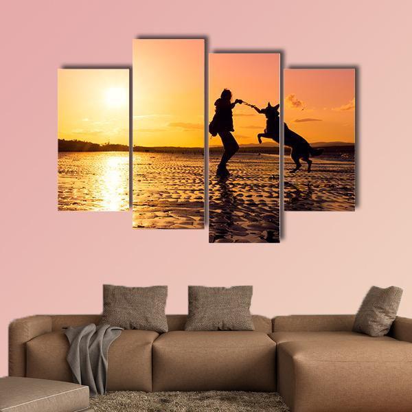 Girl Playing With Dog At Beach Canvas Wall Art-4 Pop-Gallery Wrap-50" x 32"-Tiaracle