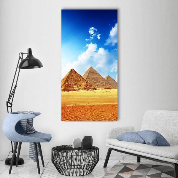 Great Pyramids of Giza Vertical Canvas Wall Art in gold, yellow and blue, single vertical panel hung on a wall