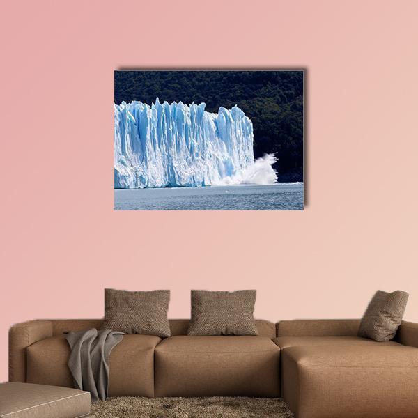 Glacier Calving Over Water Canvas Wall Art in black, white and blue, single panel hung on a wall