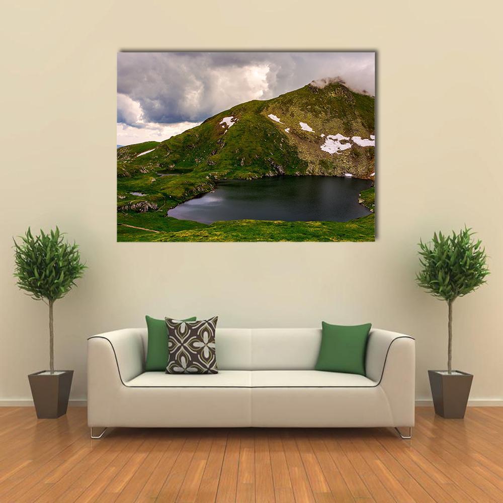 Glacier Lake Capra Canvas Wall Art in white, gray and green, single panel hung on a wall