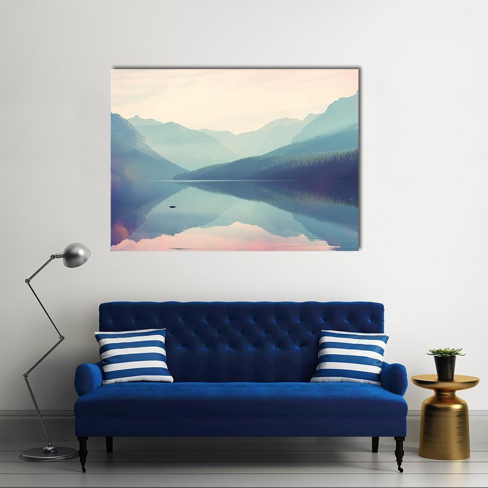 Glacier National Park Lake Reflection Canvas Wall Art in white, blue and pink, single panel hung on a wall