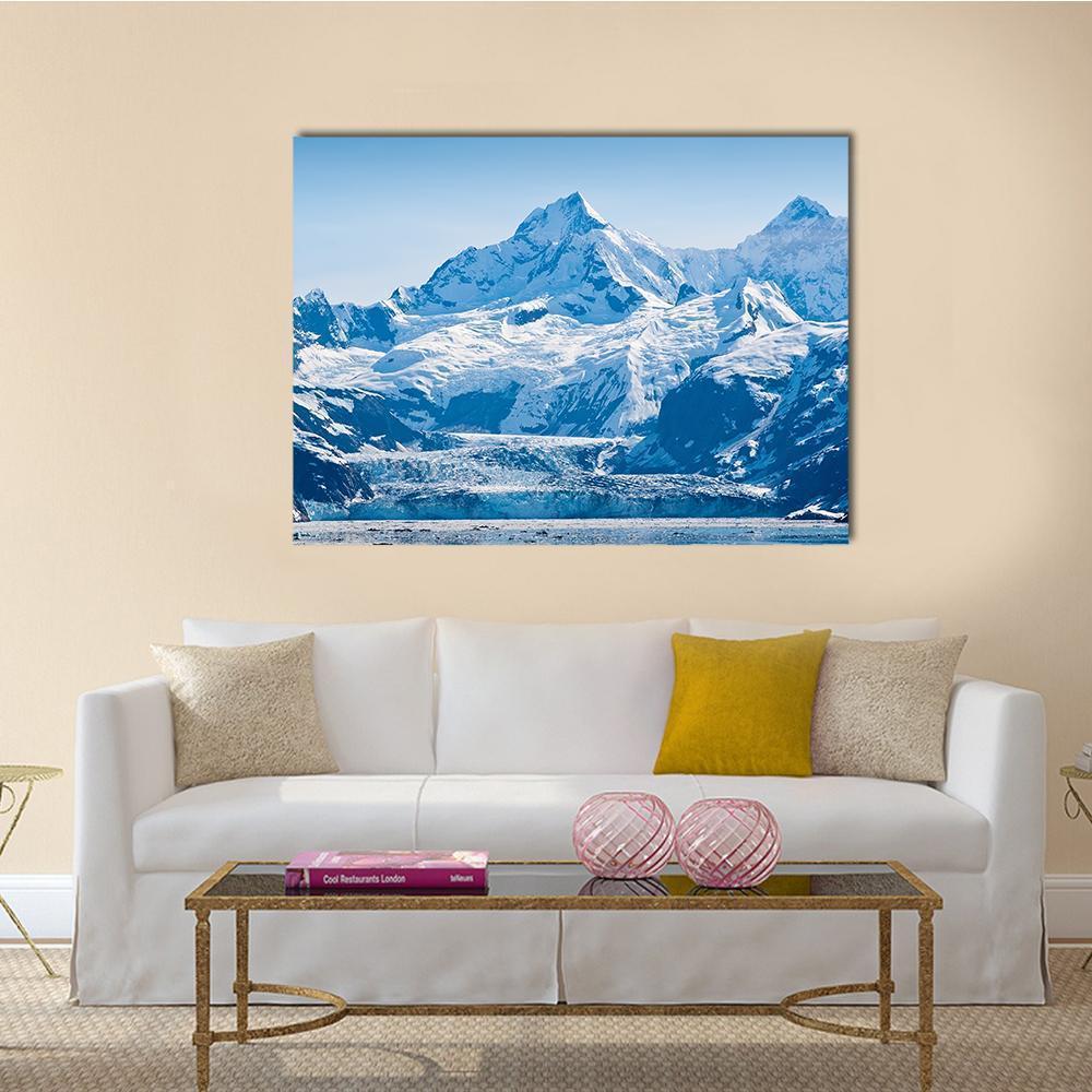 Glacier and Snow Capped Mountains Canvas Wall Art in white and blue, single panel hung on a wall