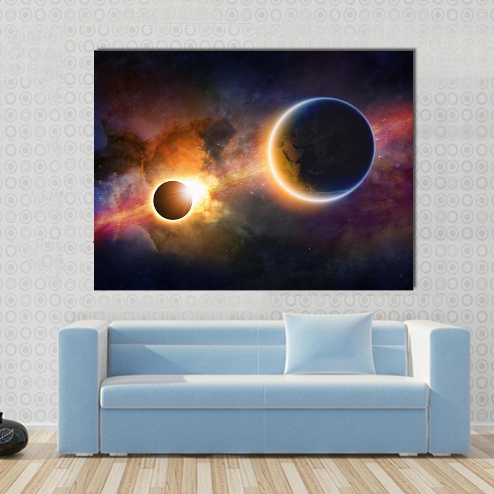 Glowing Planet Earth in Space Canvas Wall Art in black, orange and blue, single panel hung on a wall