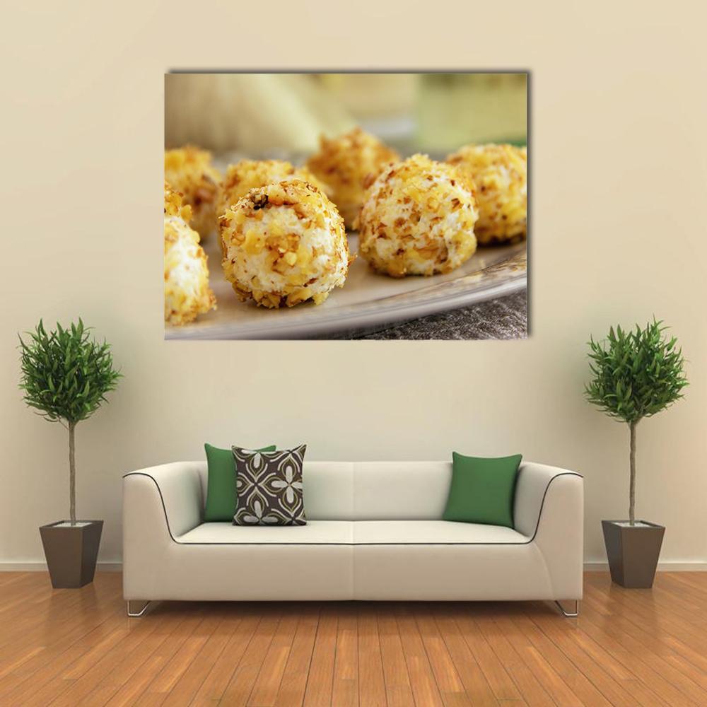 Goat Cheese Balls Close-up Canvas Wall Art in white, beige and yellow, single panel hung on a wall