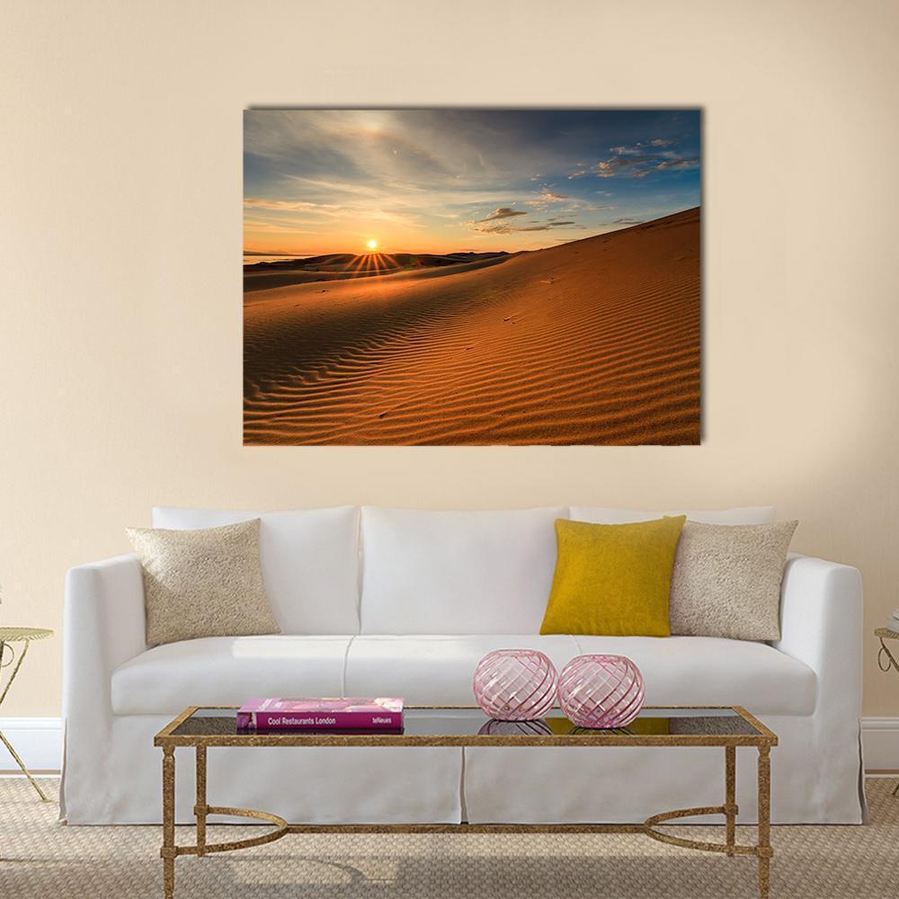 Gobi Desert at Sunset Canvas Wall Art in brown, orange and blue, single panel hung on a wall