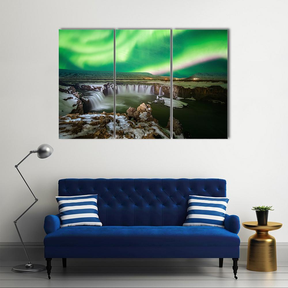 Godafoss Waterfall and Aurora Canvas Wall Art in black, white and green, 4 panel Pop layout hung on a wall