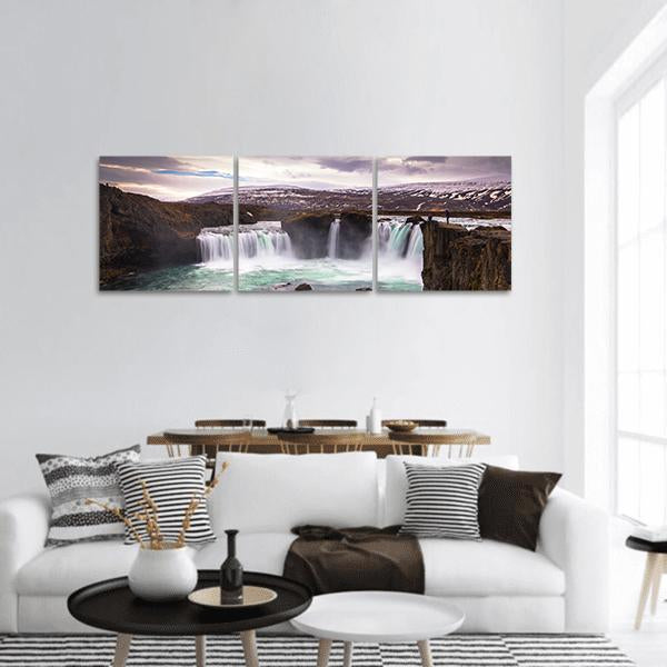 Godafoss Waterfall, Iceland Panoramic Canvas Wall Art in white, brown and blue, hung on a wall