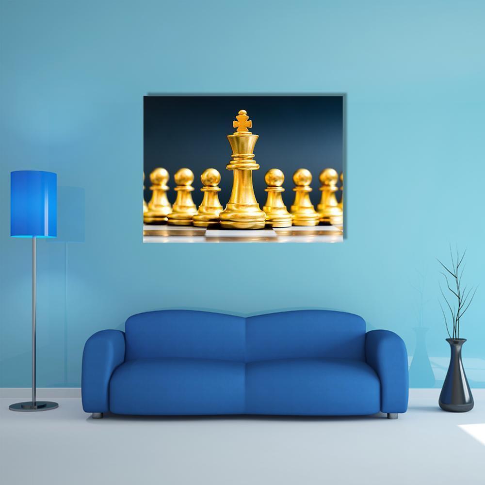 Gold Chess Pieces Close-up Canvas Wall Art in black and gold, single panel hung on a wall