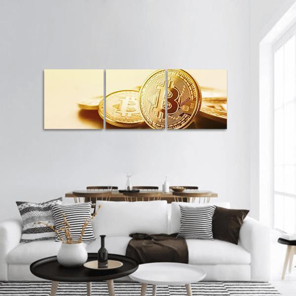 Close-up of Golden Bitcoins Panoramic Canvas Wall Art in gold and yellow, single panel hung on a wall