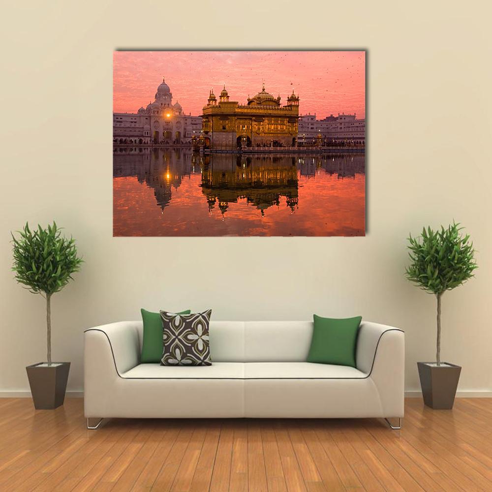 Golden Temple in Amritsar Canvas Wall Art in gold, orange and pink, single panel hung on a wall