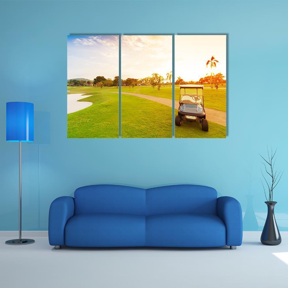 Golf Cart at Tropical Sunset Canvas Wall Art in orange, yellow and green, 3 panel horizontal set hung on a wall