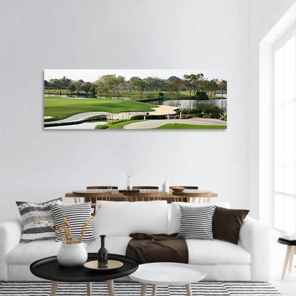 Serene Golf Course Landscape Panoramic Canvas Wall Art in white, beige and green, hung on a wall