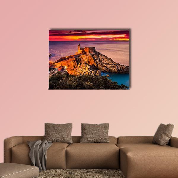 Gothic Church of St Peter at Sunset Canvas Wall Art in orange, blue and purple, single panel hung on a wall