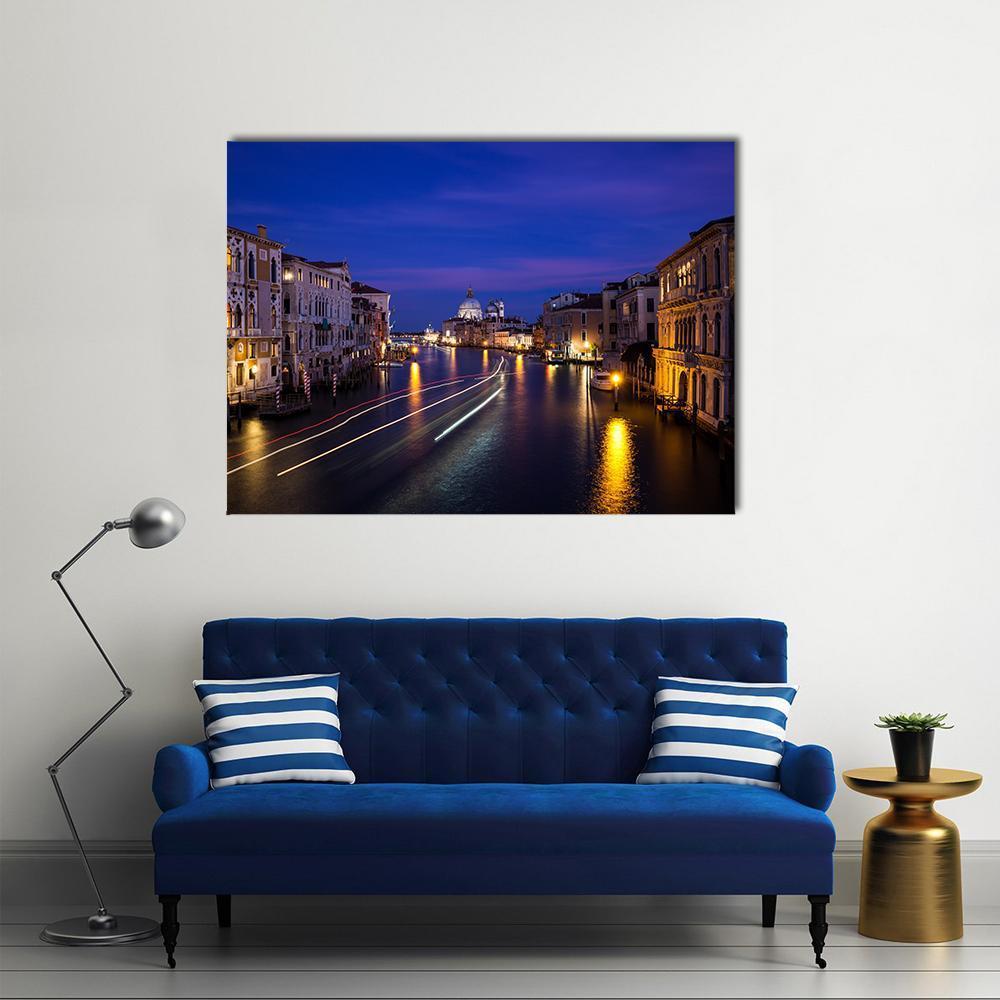 Grand Canal at Night Canvas Wall Art in yellow, blue and navy, single panel hung on a wall