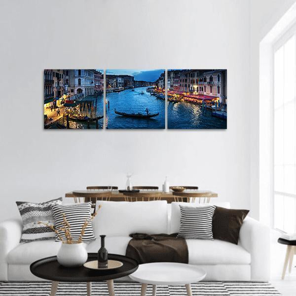 Venice Grand Canal at Dusk Panoramic Canvas Wall Art in orange, yellow and blue, hung on a wall