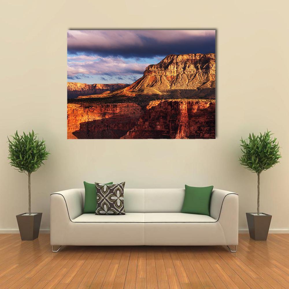 Grand Canyon National Park Canvas Wall Art in brown, orange and blue, single panel hung on a wall