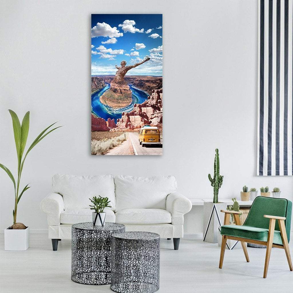 Grand Canyon with Giant Statue Vertical Canvas Wall Art in brown, orange and blue, single vertical panel hung on a wall