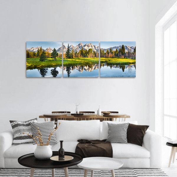 Grand Teton Range, Us Rockies Panoramic Canvas Wall Art in white, green and blue, hung on a wall