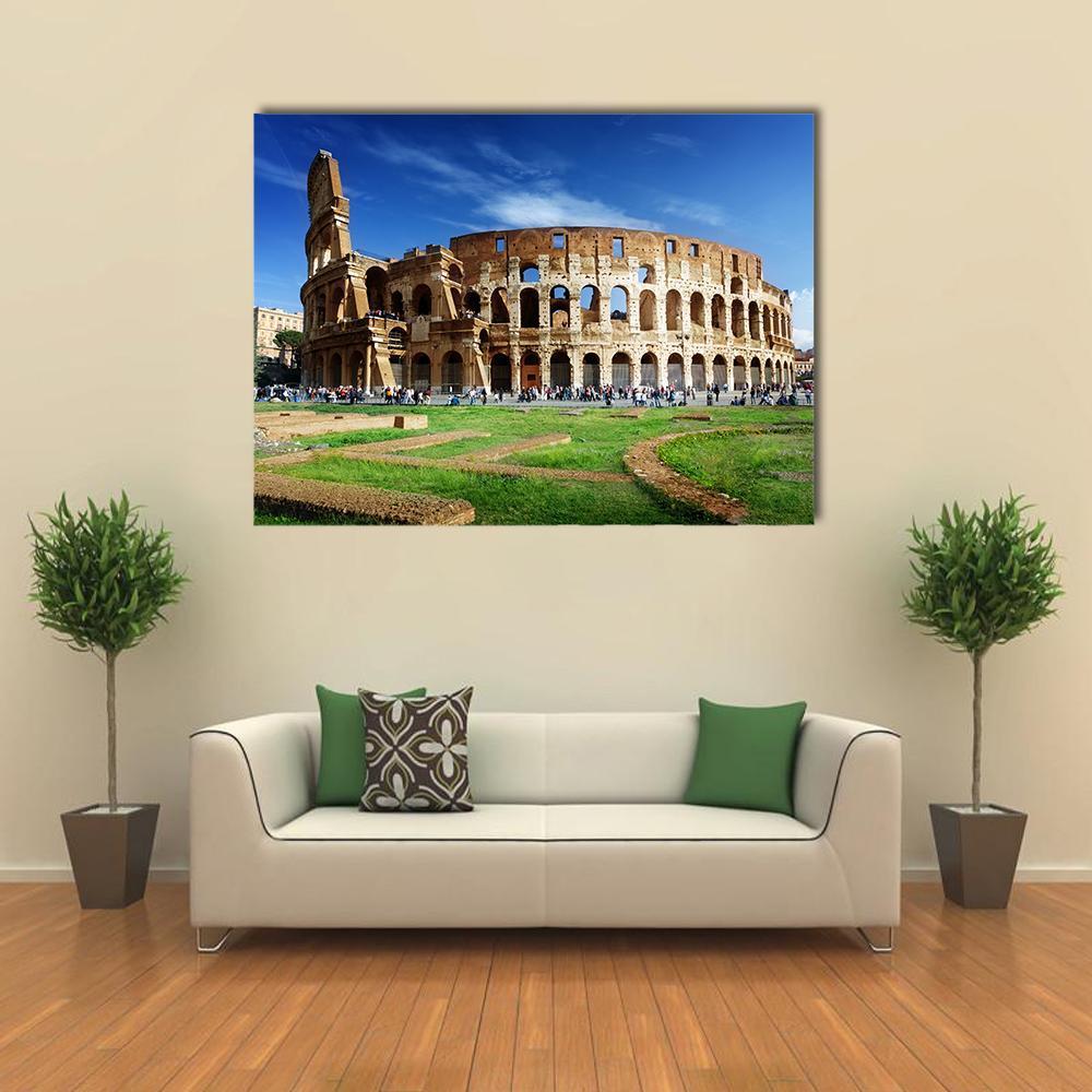 Colosseum in Rome Canvas Wall Art in brown, green and blue, single panel hung on a wall