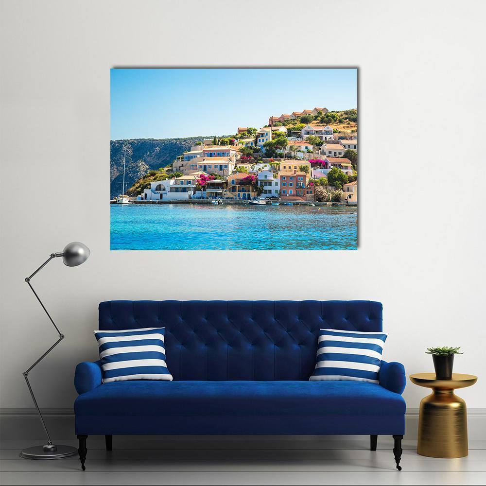 Kefalonia Village by the Sea Canvas Wall Art in beige and blue, single panel hung on a wall