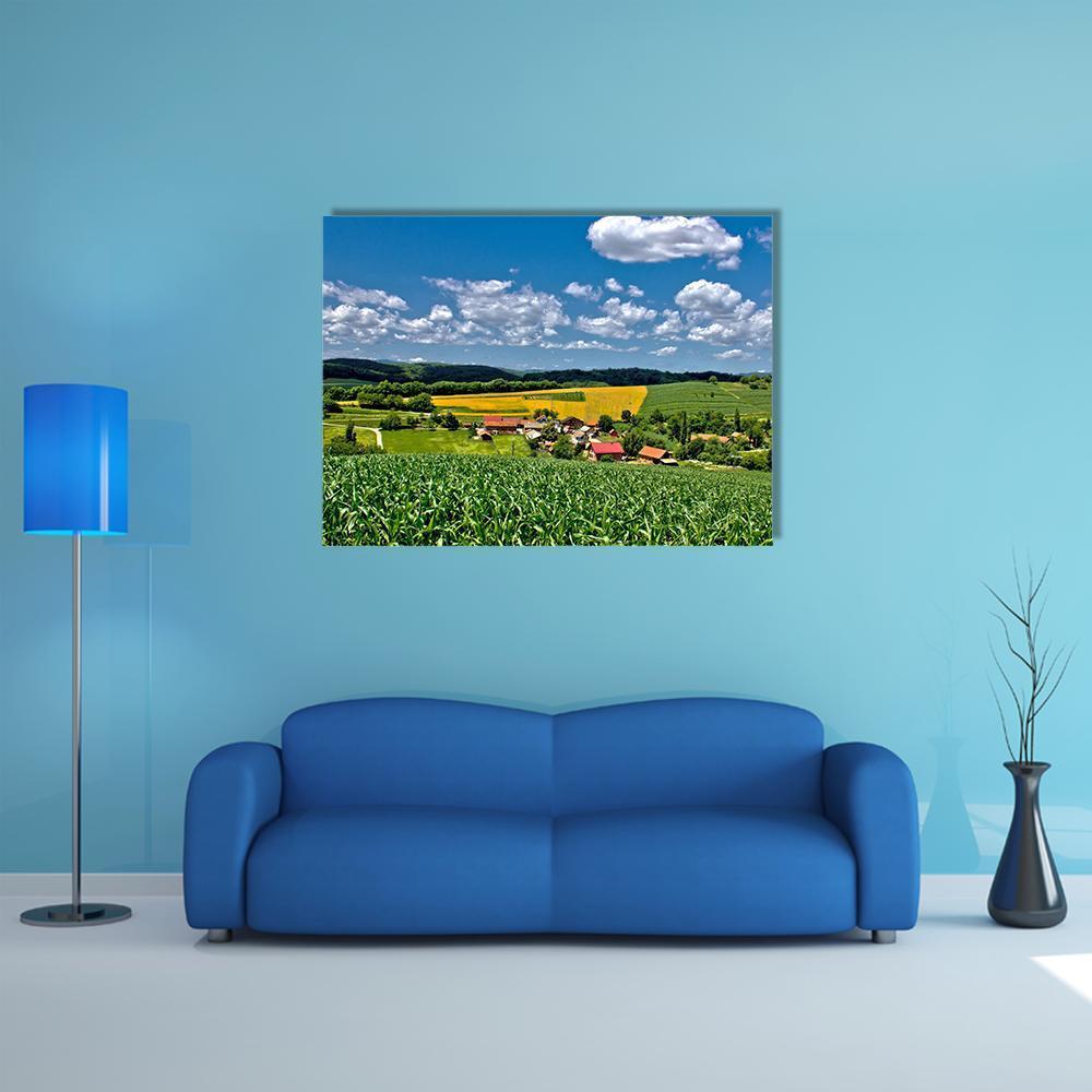 Green Village in Croatia Canvas Wall Art in green and blue, single panel hung on a wall