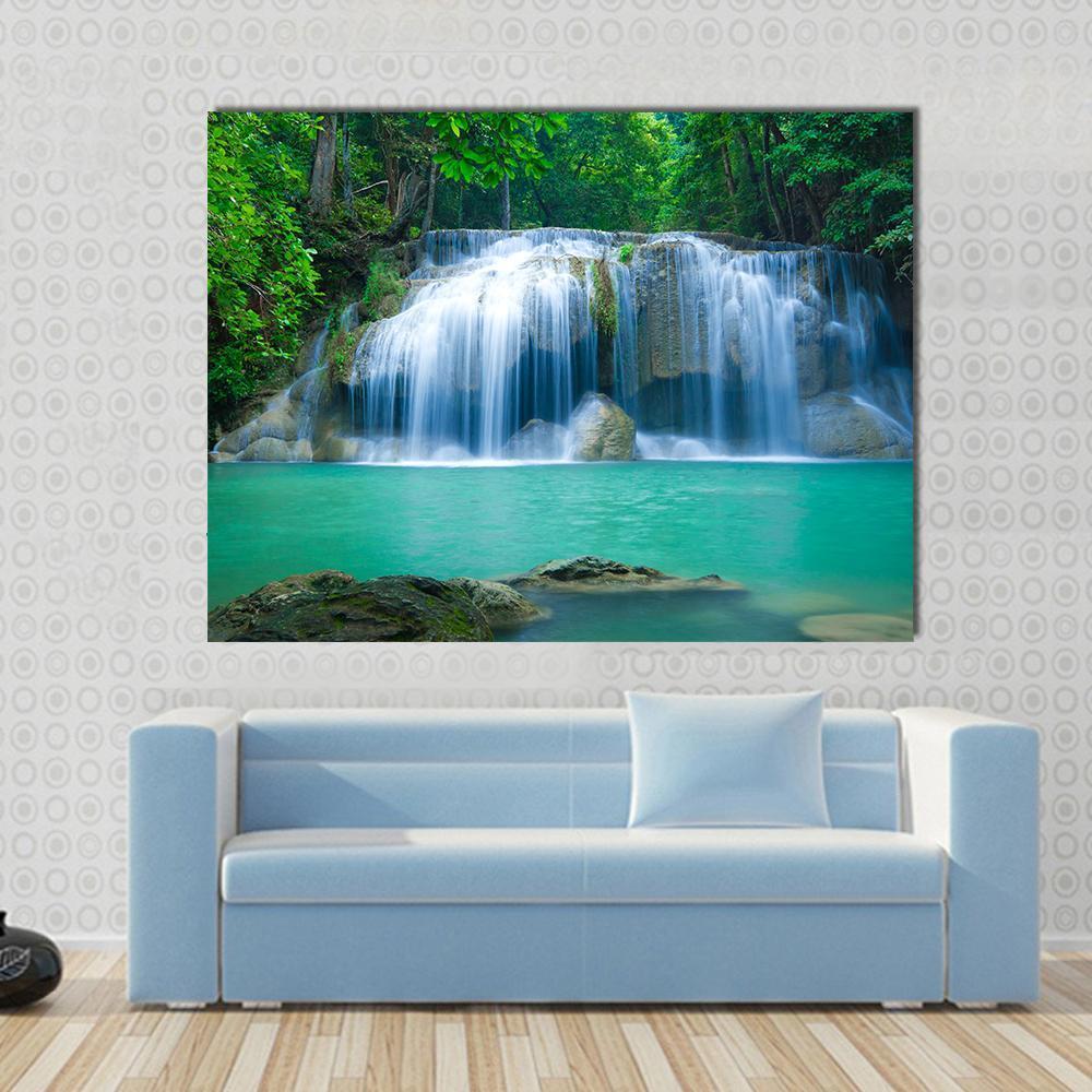 Green Waterfall Canvas Wall Art in white, green and blue, single panel hung on a wall