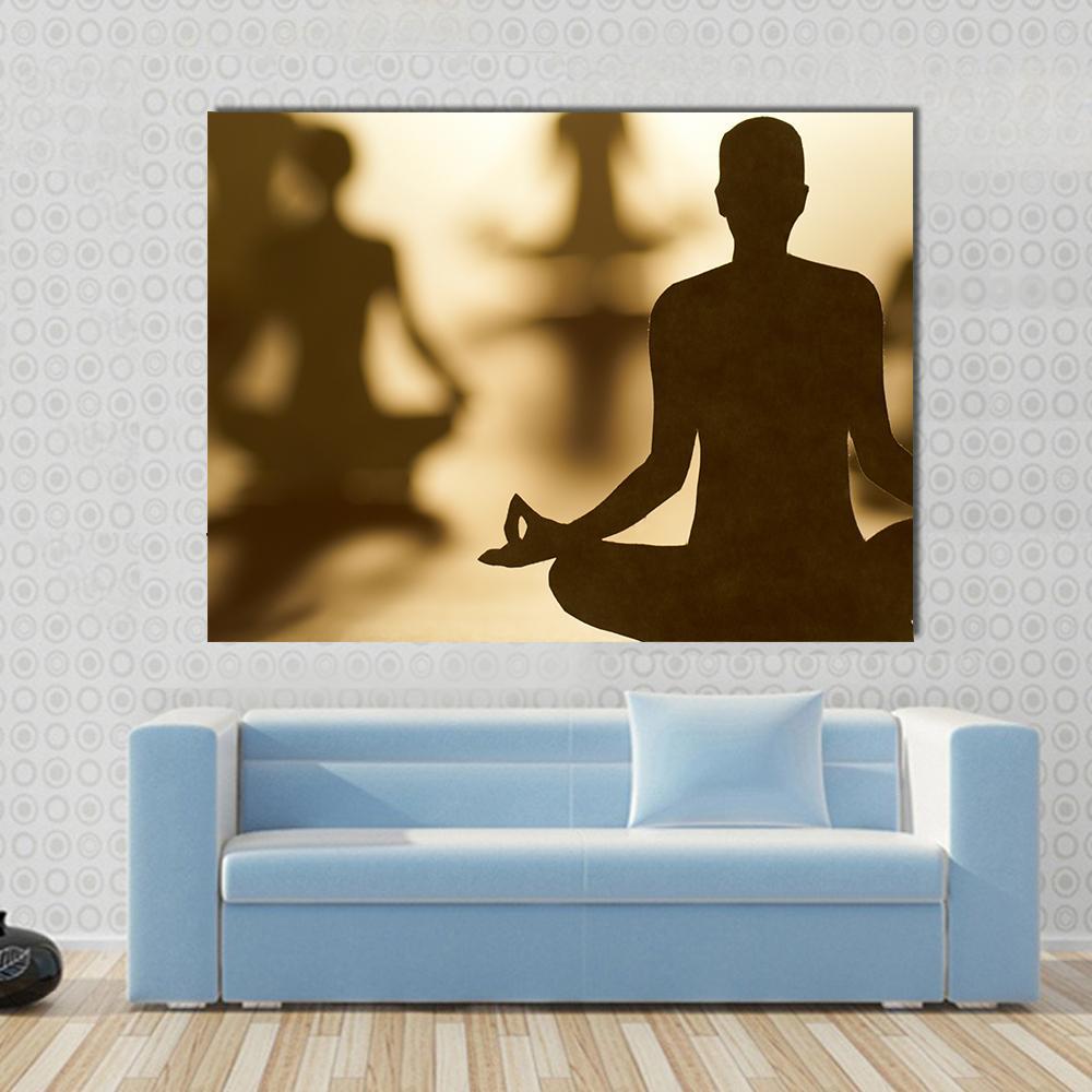 Group of People Doing Yoga Canvas Wall Art in beige, brown and yellow, single panel hung on a wall